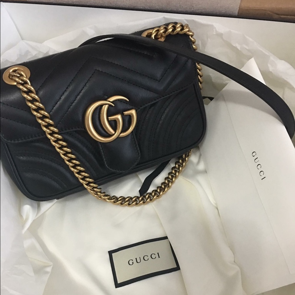 Gucci handbag with receipt, box and dust bag.